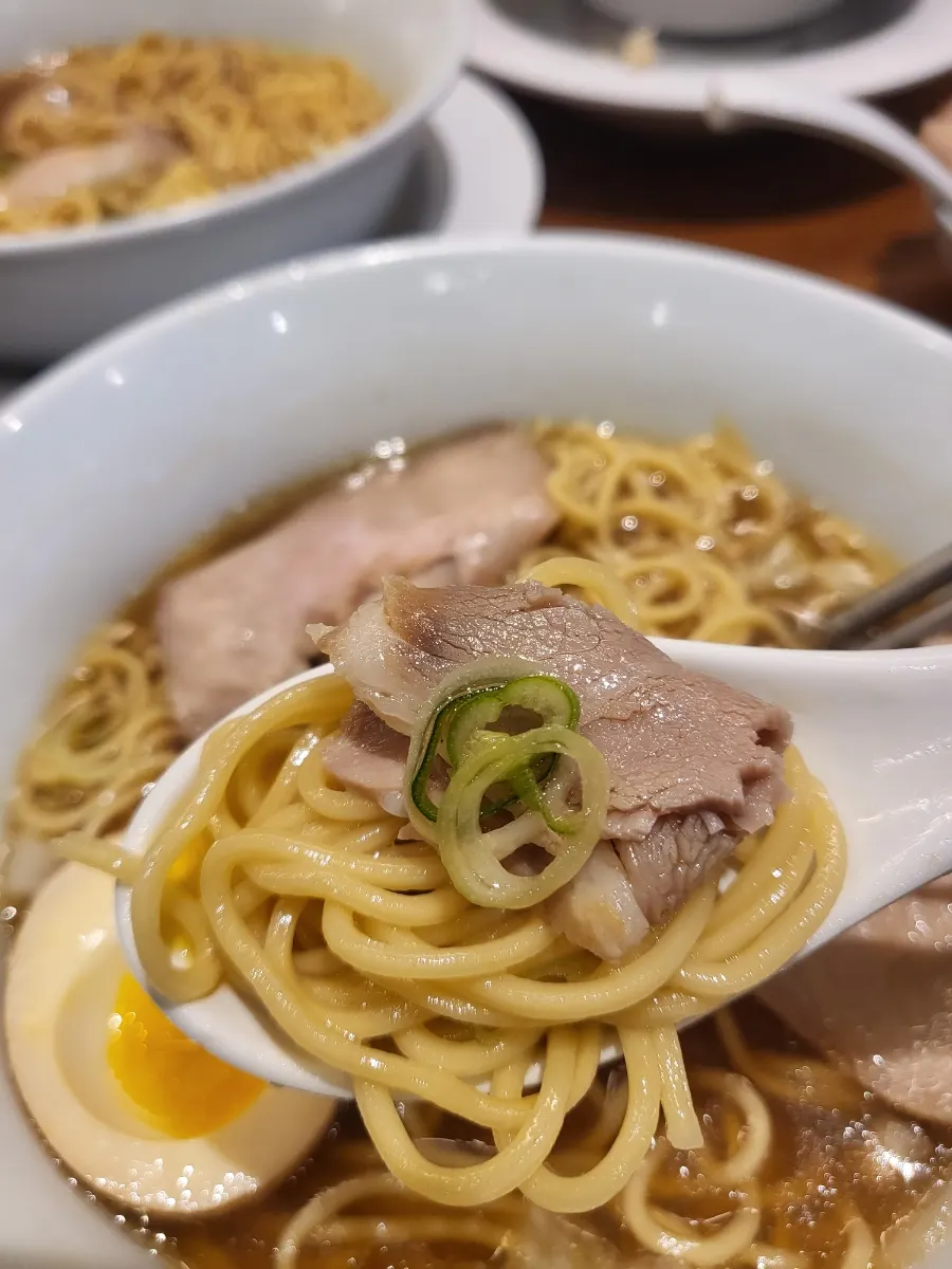A bowl of soyu ganjang ramen ordered with adjusted salt level