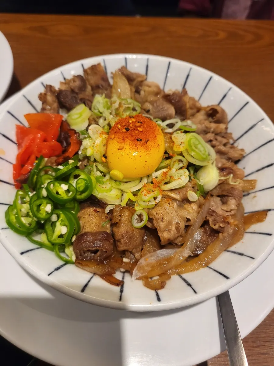 Ramen broth with onion topping