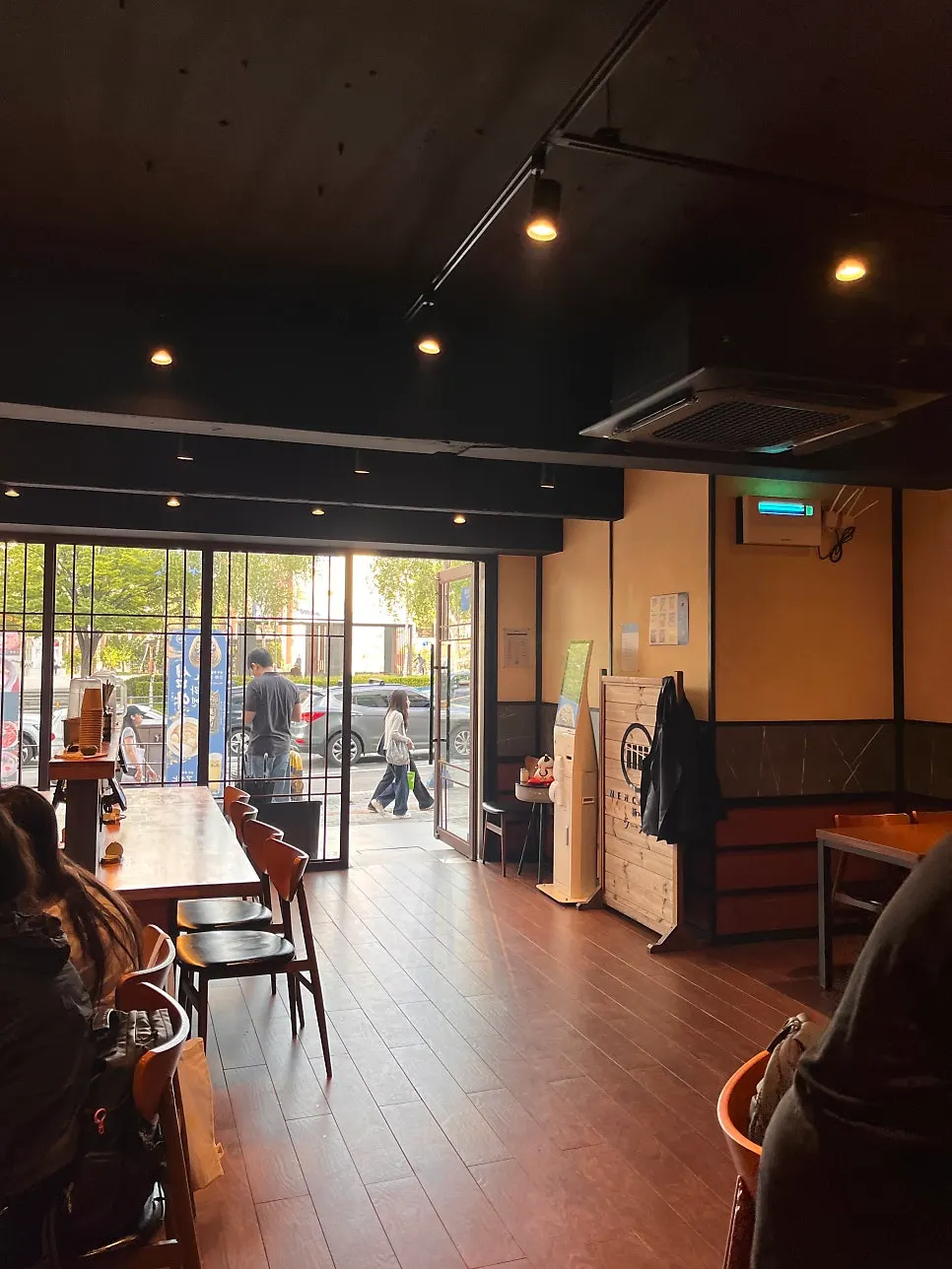 Interior of the ramen restaurant with wood-tone decor