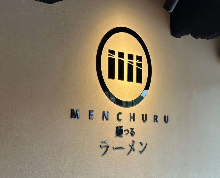 Wrapping up a meal near Children's Grand Park at Mentsuru