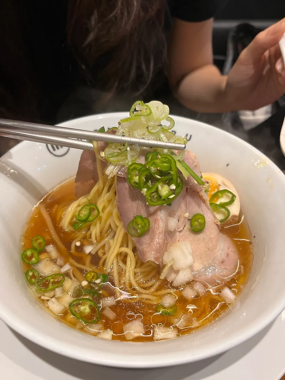 Shoyu ramen with noodles lifted up