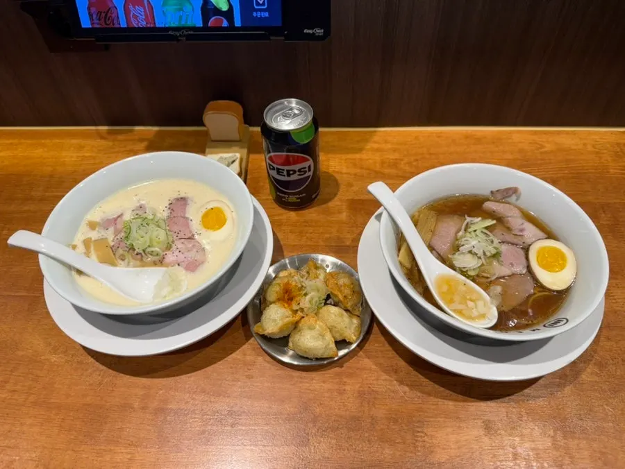 Table with tori paitan, gyoza, and shoyu ramen together