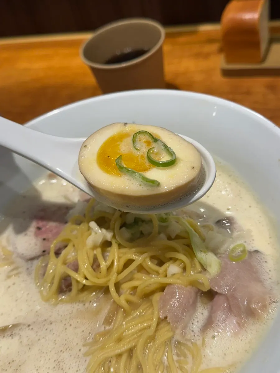 Soft-boiled egg on top of the ramen