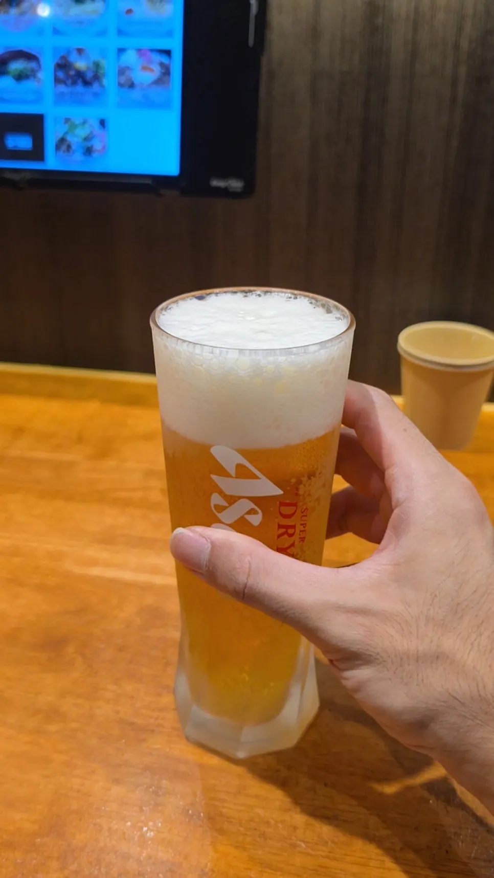 A glass of Asahi draft beer at Mentsuru