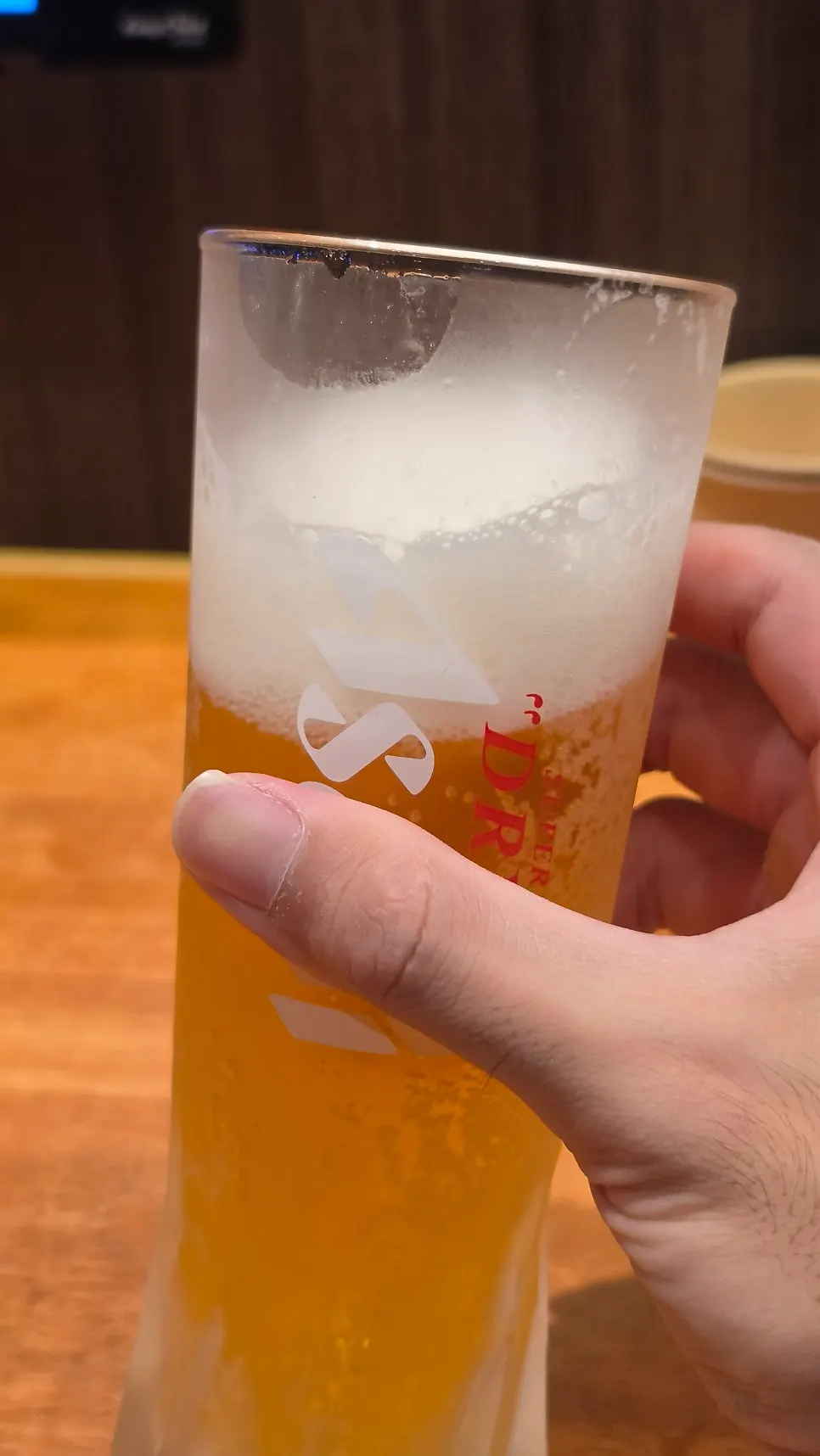 Cold draft beer paired with ramen