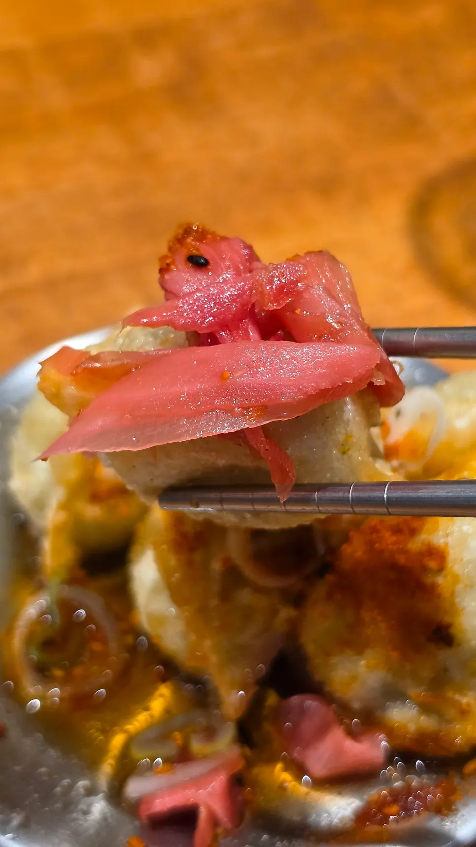 A freshly fried piece of gyoza
