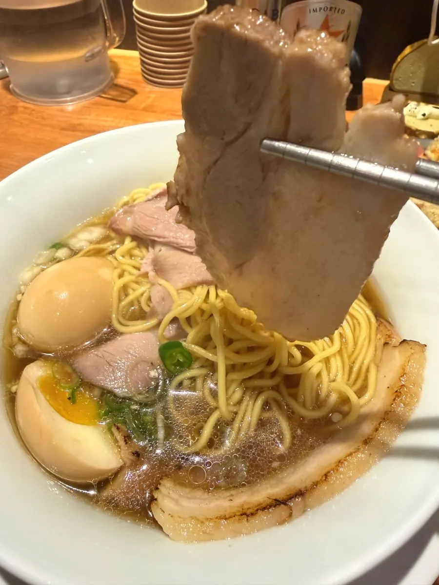 Pork belly chashu and soft-boiled egg on shoyu ramen
