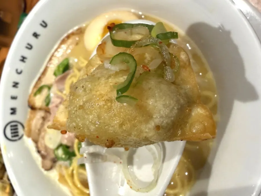 Fried gyoza with pickled yuzu radish and Sapporo beer
