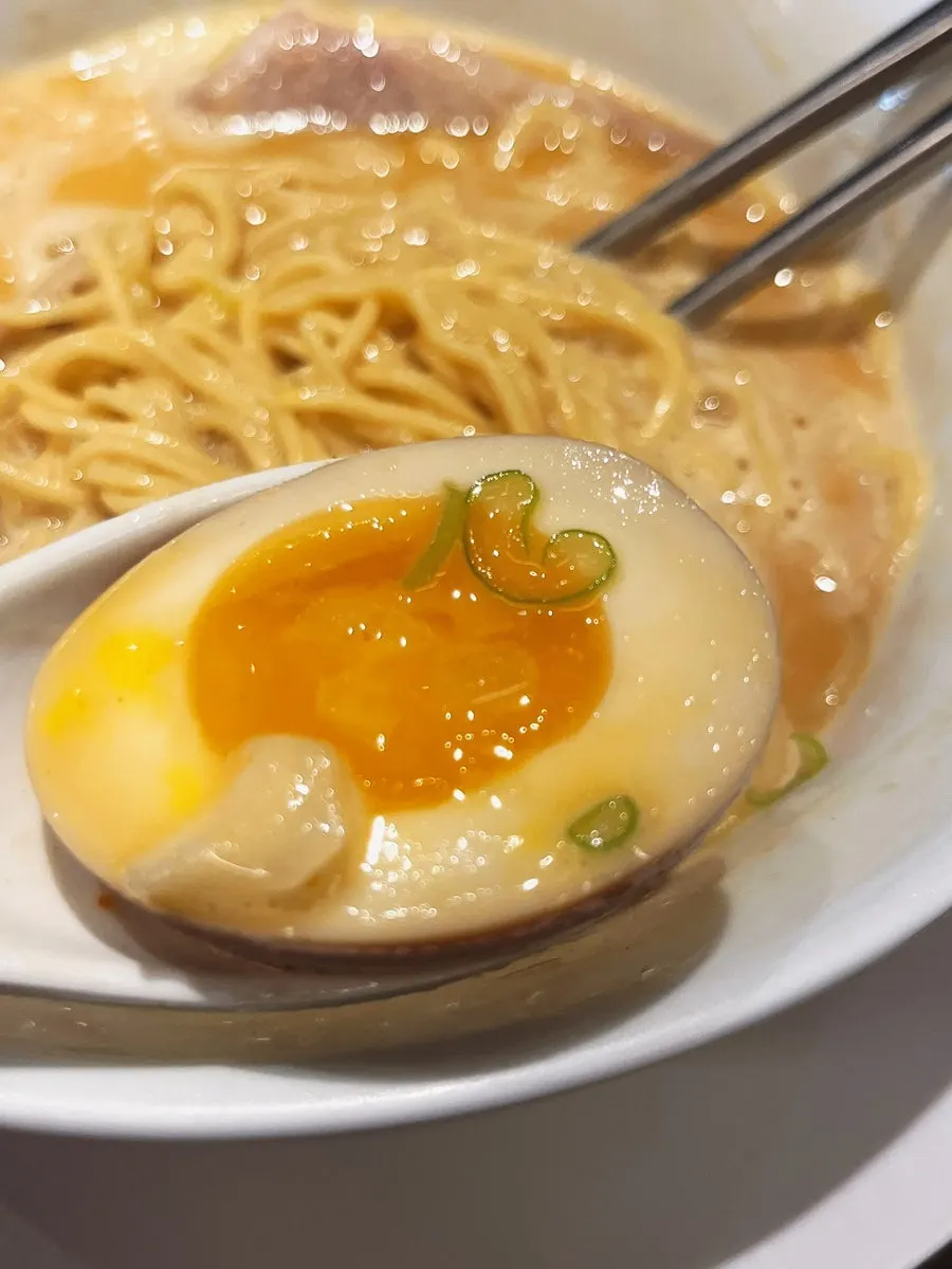 Close-up of pork belly chashu topping on the ramen