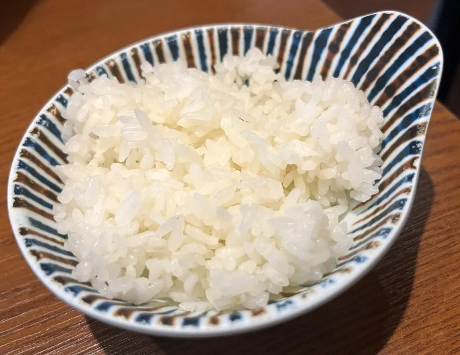 Mentsuru's soft-boiled egg topping cut in half