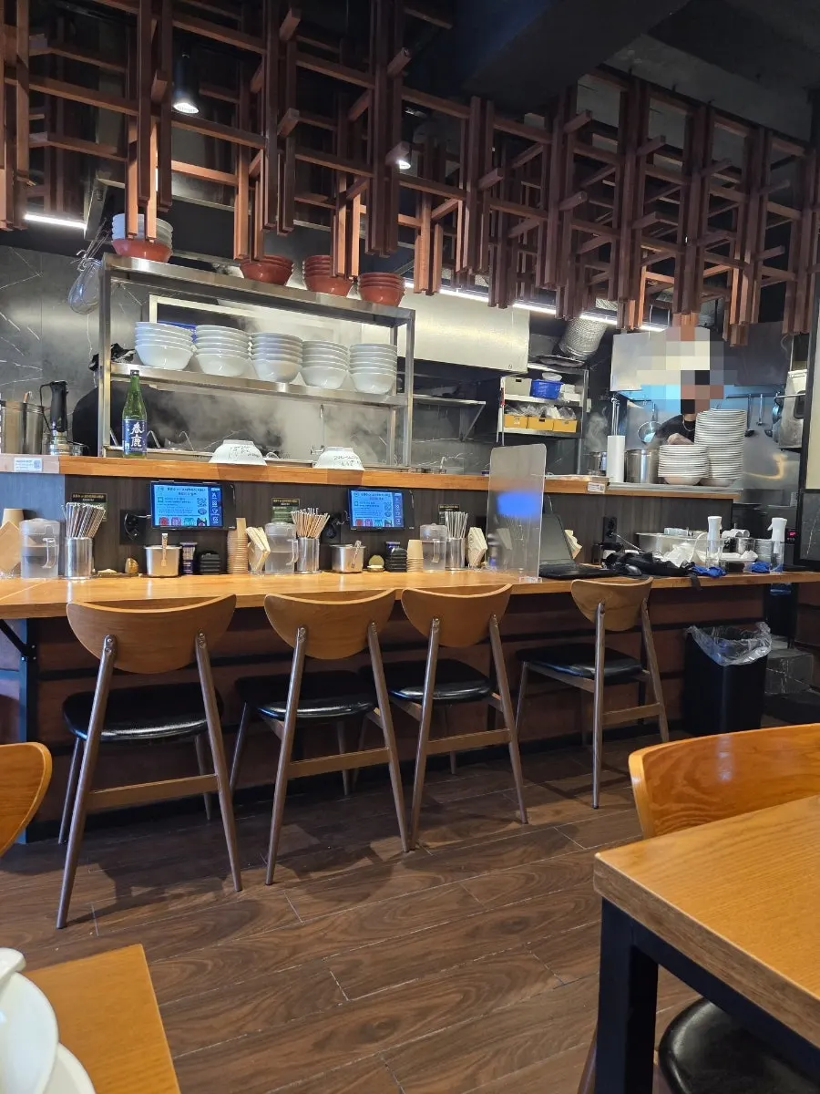 Mentsuru menu showing extra toppings and drink options