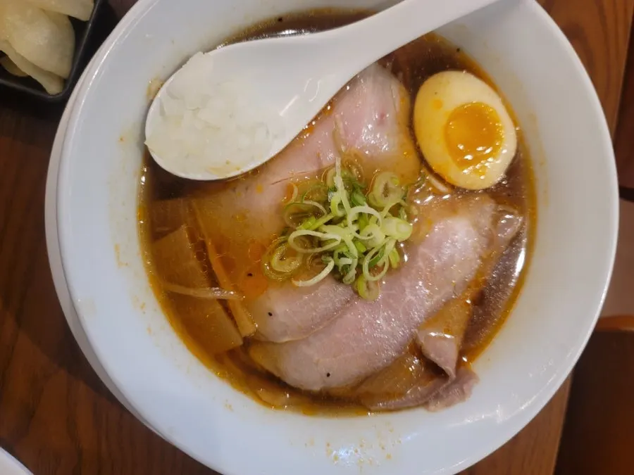 A bowl of Mentsuru's spicy shoyu ramen