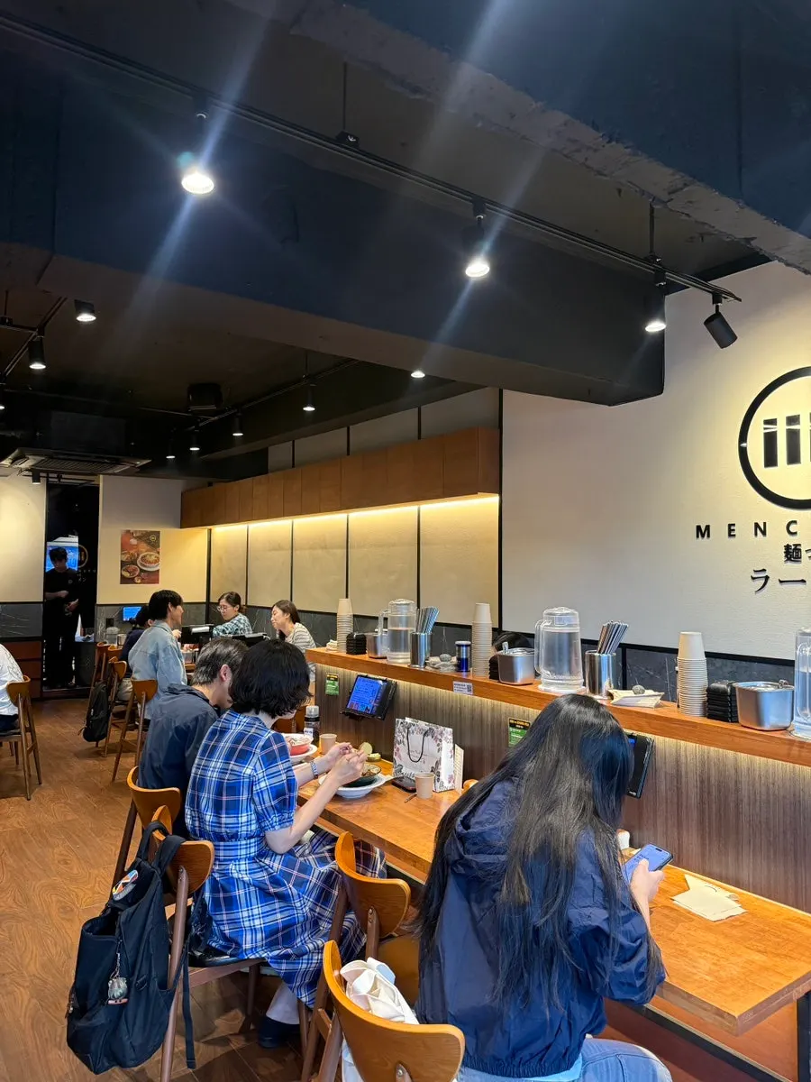 Interior of Mentsuru with wood-toned decor