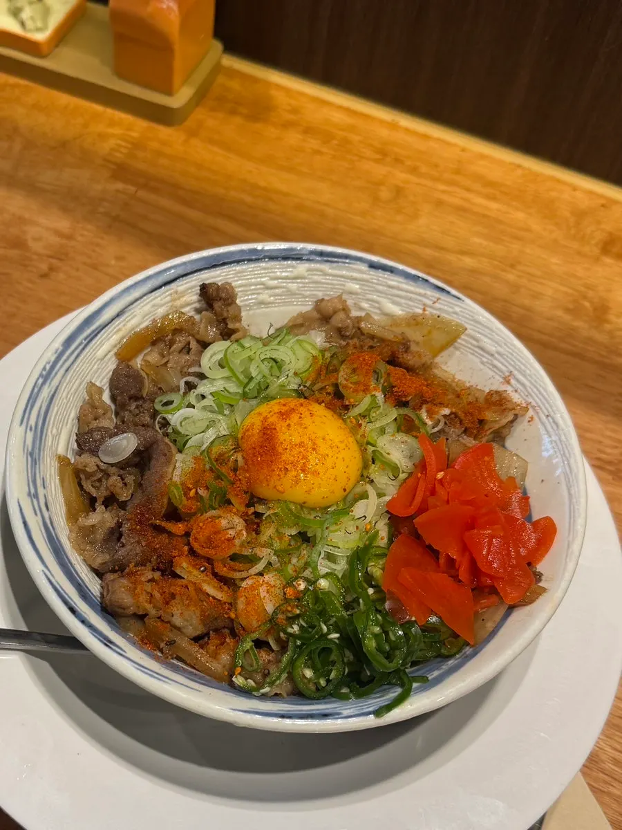 Mentsuru's gyudon topped with an egg yolk