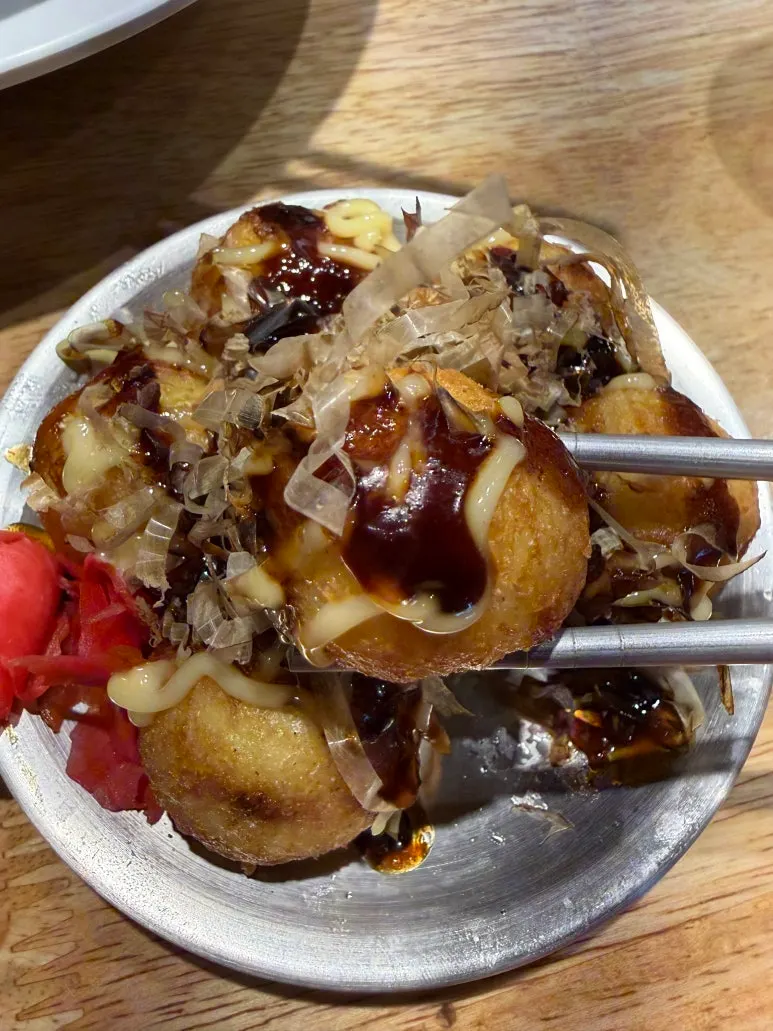 Takoyaki topped with bonito flakes