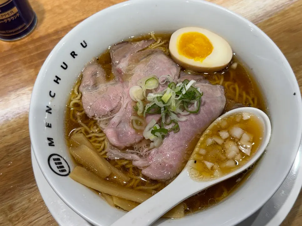 Three bowls of ramen set on the table