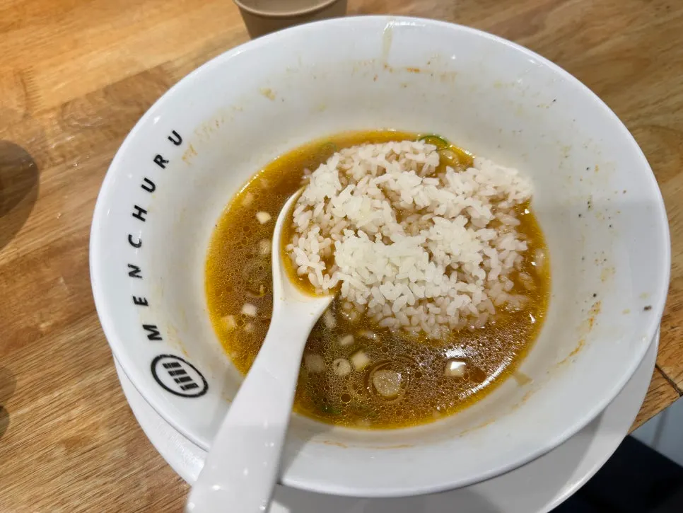 A soft-boiled egg in the tsukemen sauce