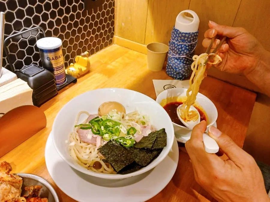 Close-up of meat topping and egg on cold tsukemen