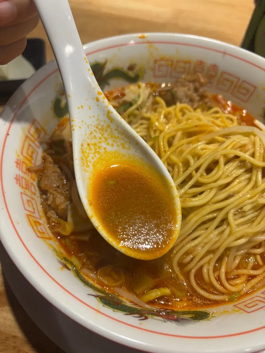 Motsu ramen broth with brisket mixed in