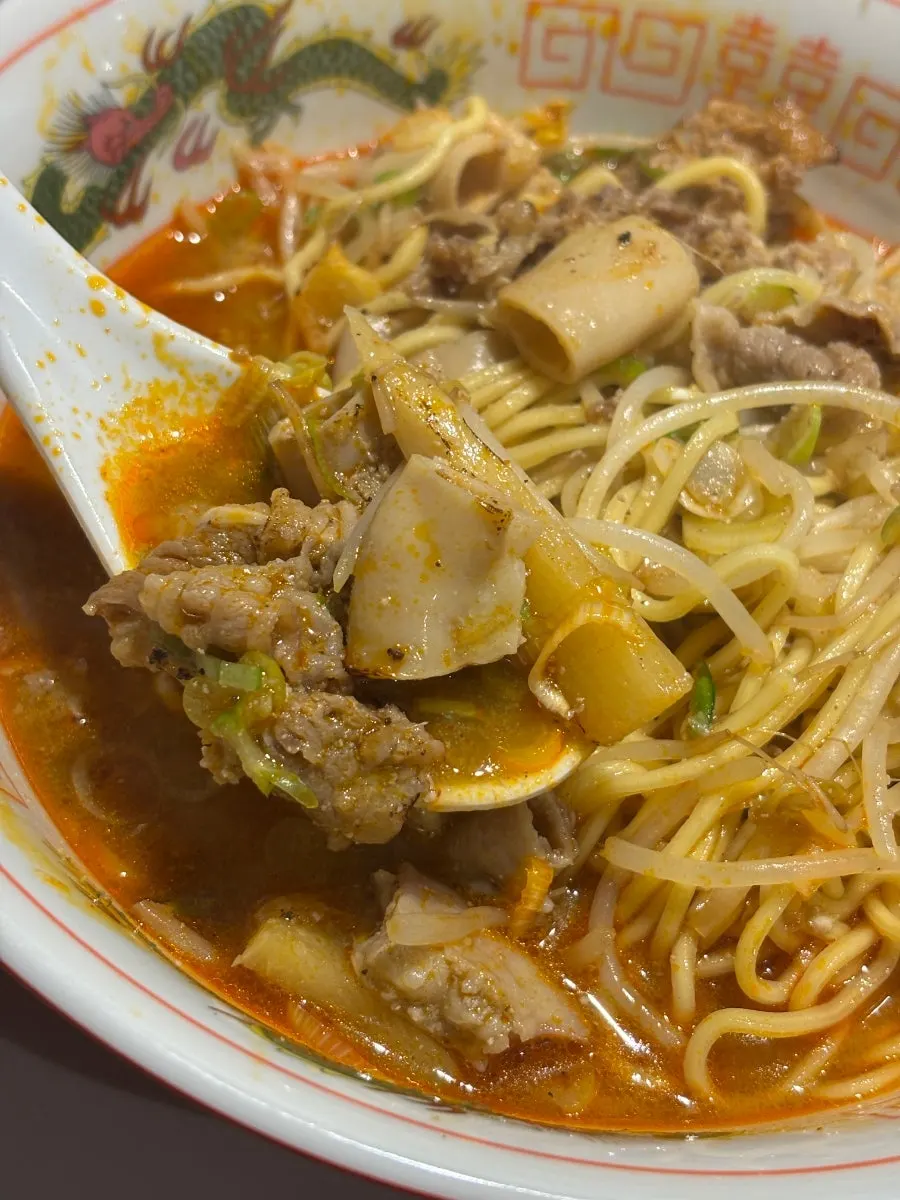 Beef tripe piled on top of the noodles