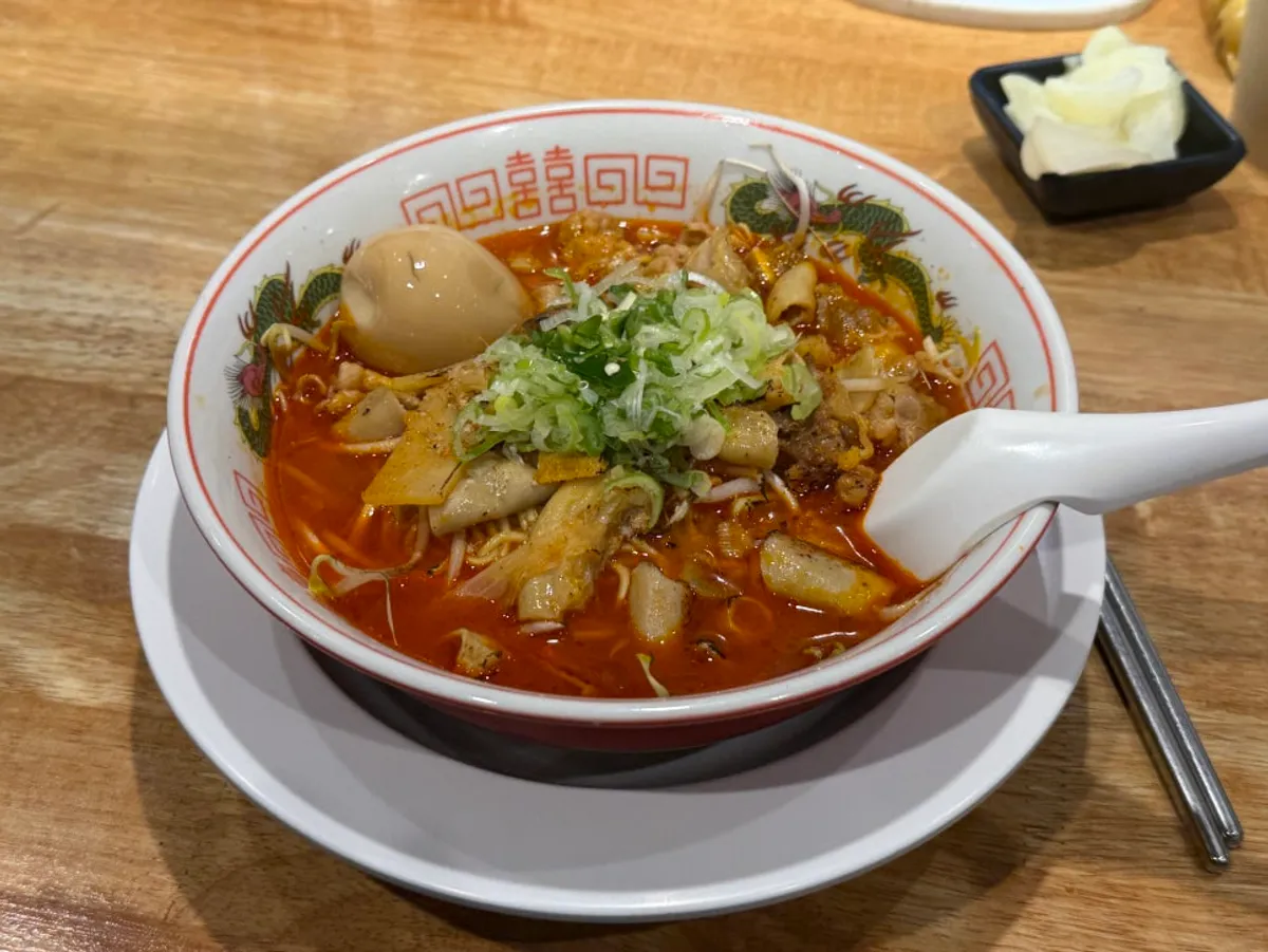 Motsu ramen with added egg at Mentsuru City Hall Branch