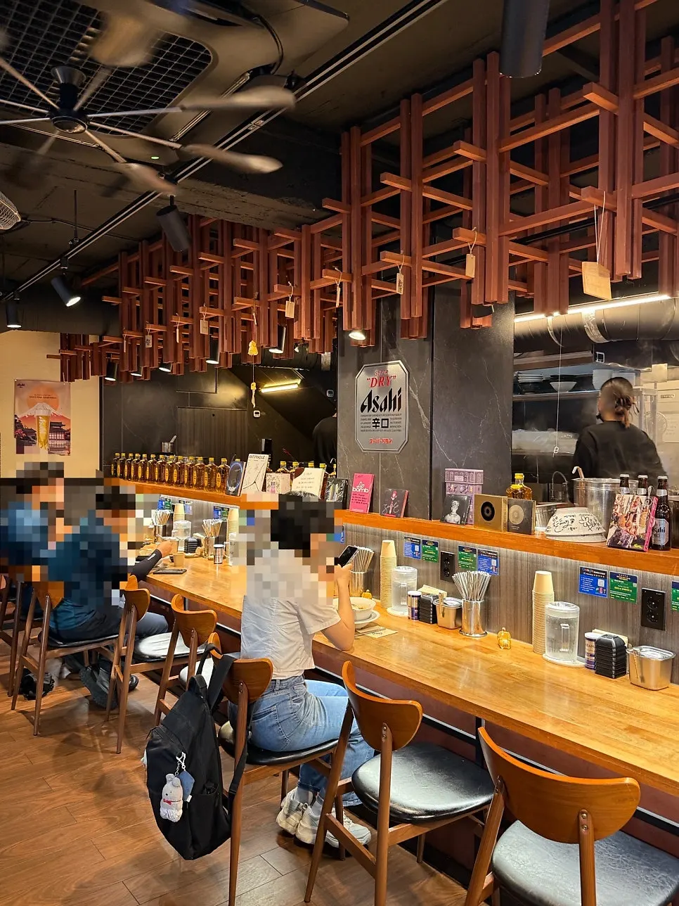 Store interior with wood-toned tables and soft lighting