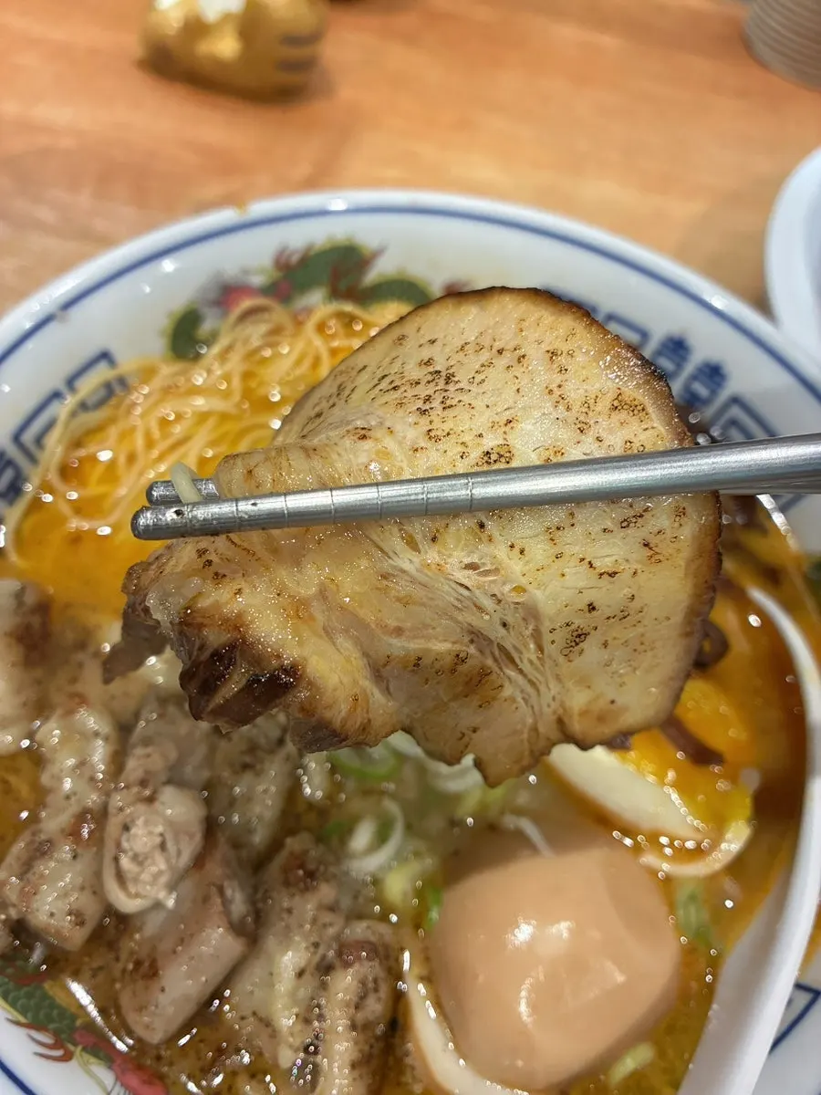 Noodles lifted from the motsu tonkotsu ramen