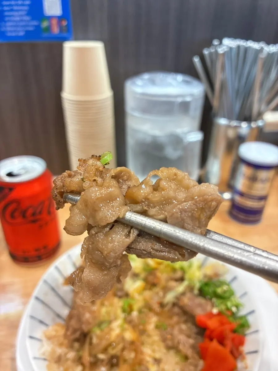 Gyudon rice bowl with burst egg yolk