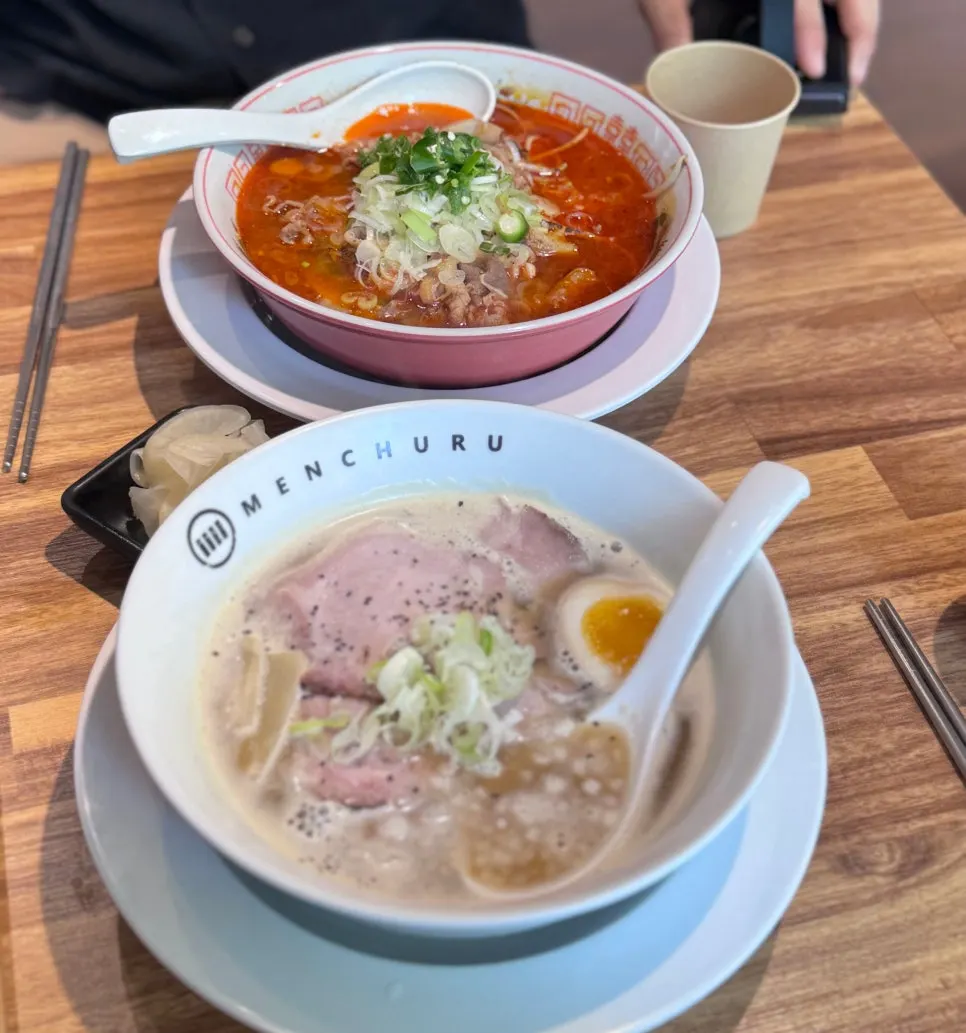 Motsu ramen and tori paitan set together on the table