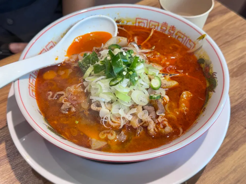 A bowl of motsu ramen topped with beef offal
