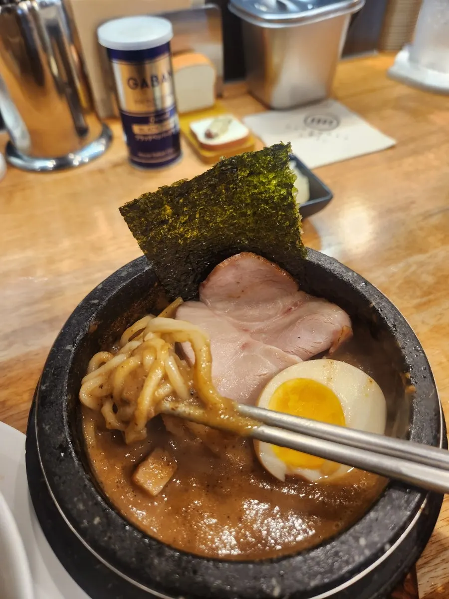 Shoyu ramen bowl showing chashu and toppings