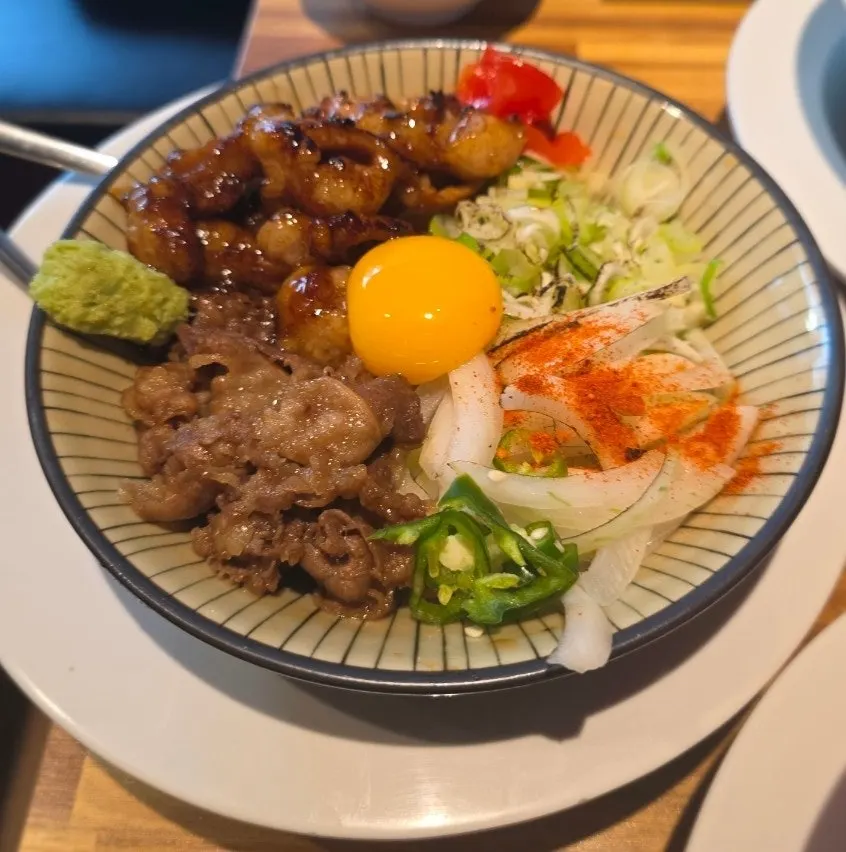 Hormone don with deeply soaked-in sauce