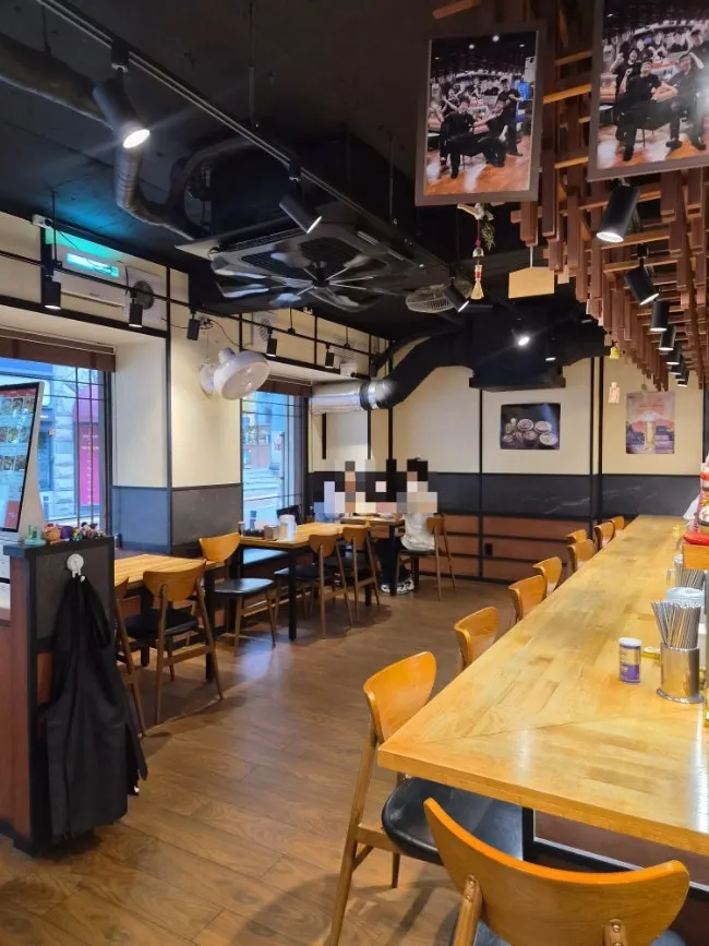 Table seating area inside the restaurant