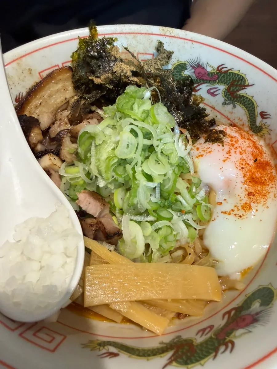 Thin noodles lifted from the shoyu ramen