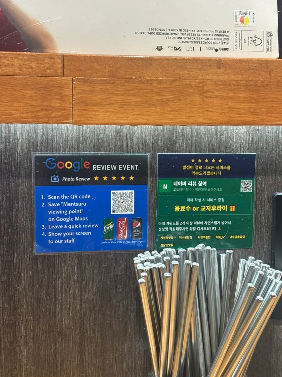 Review event signage at Mentsuru City Hall Branch