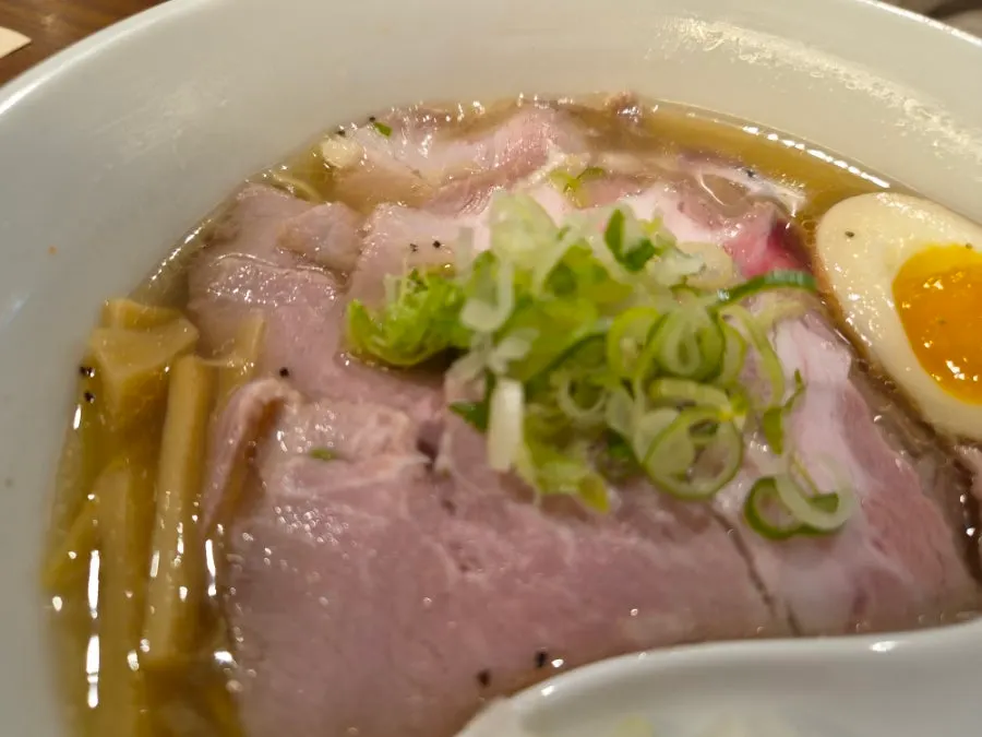 Clear shio ramen broth with chashu topping