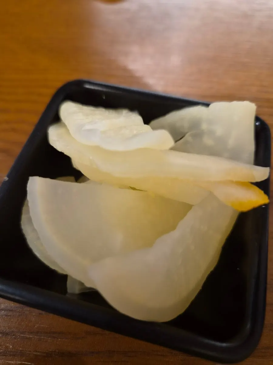 Close-up of a plate of yuzu pickled radish