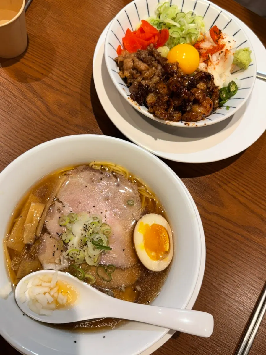 Mentsuru menu board listing ramen and rice bowls
