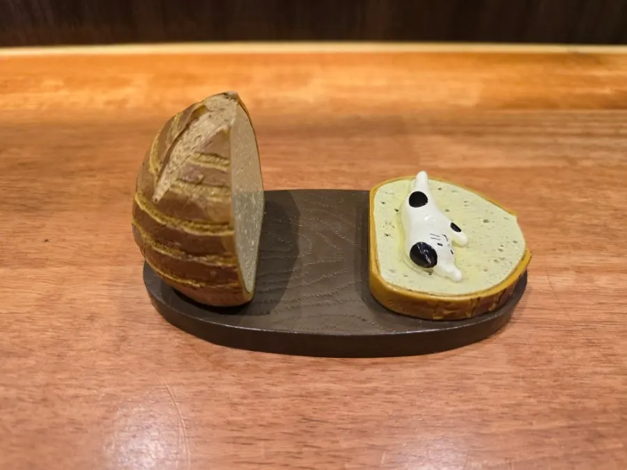 A phone stand placed on the bar seat counter