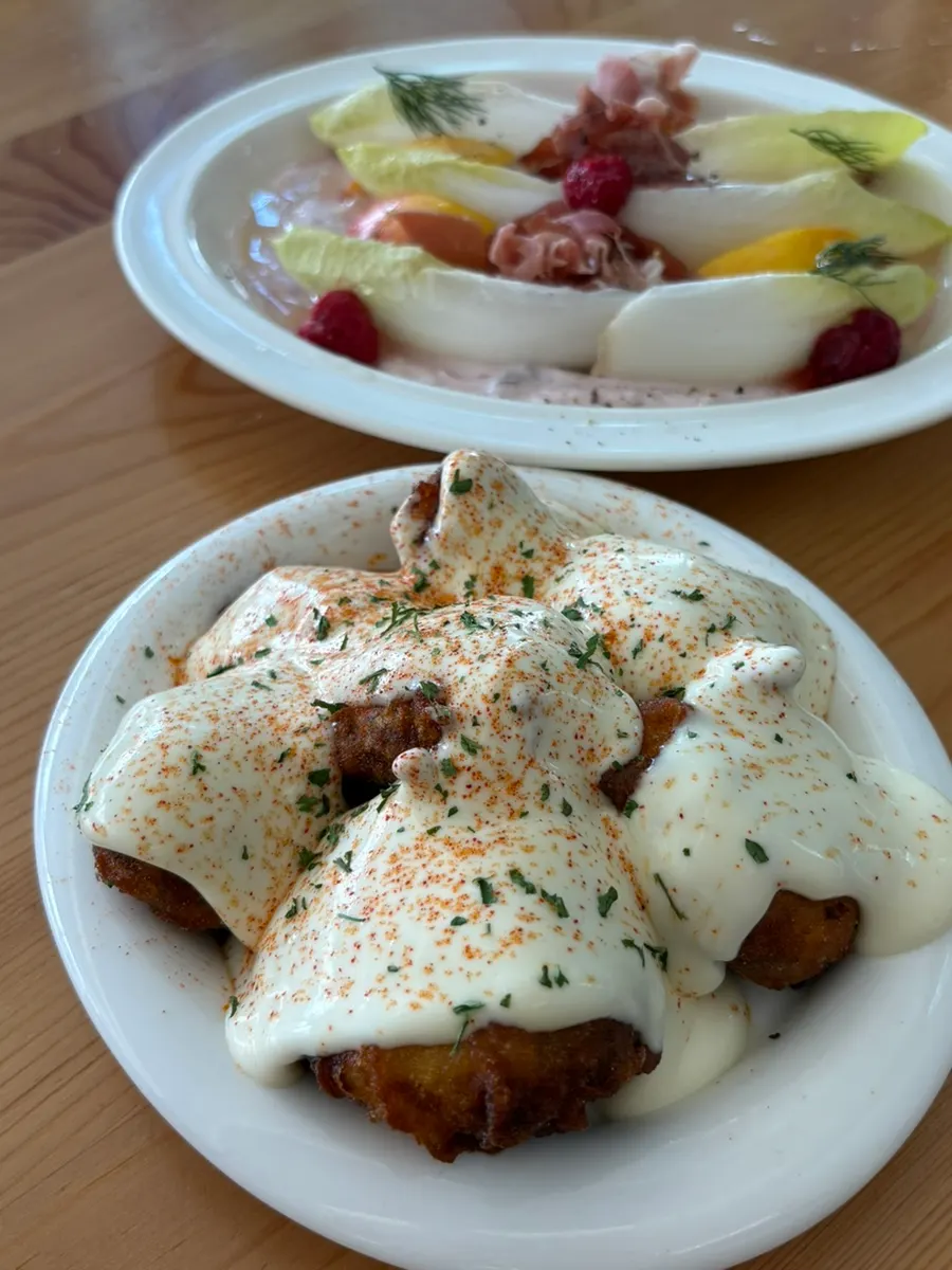 A plate of crispy fried baby potatoes