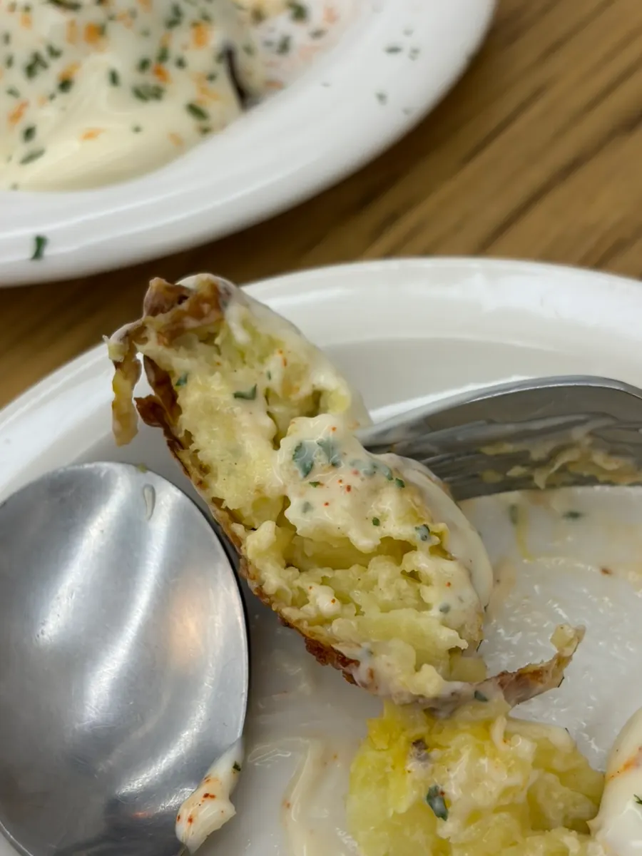 Truffle baby potato fries served with sauce