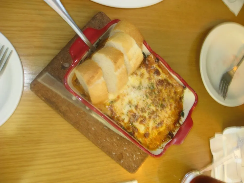 Salad scooped into a bite-sized portion