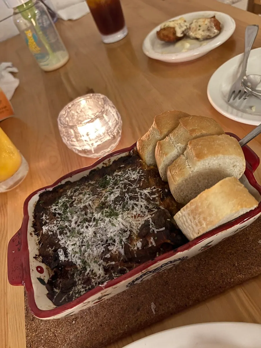 Grandma's lasagna served with baguette at Meolmeol Pangyo