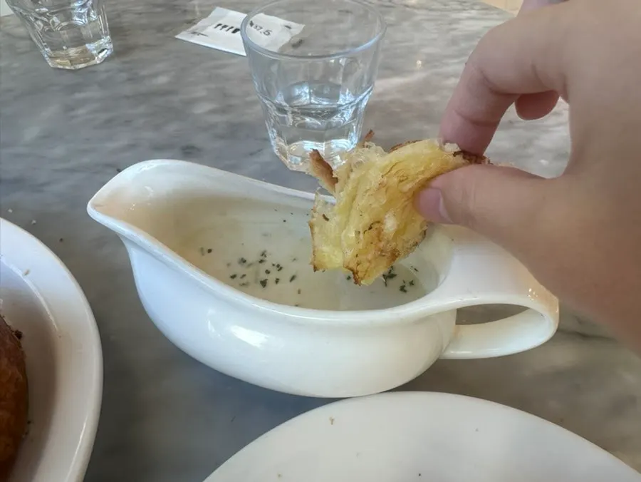 Soup and Mont Blanc bread served alongside the pasta