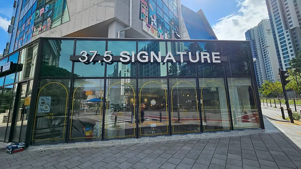 Exterior and sign of 37.5 Signature Mia Branch