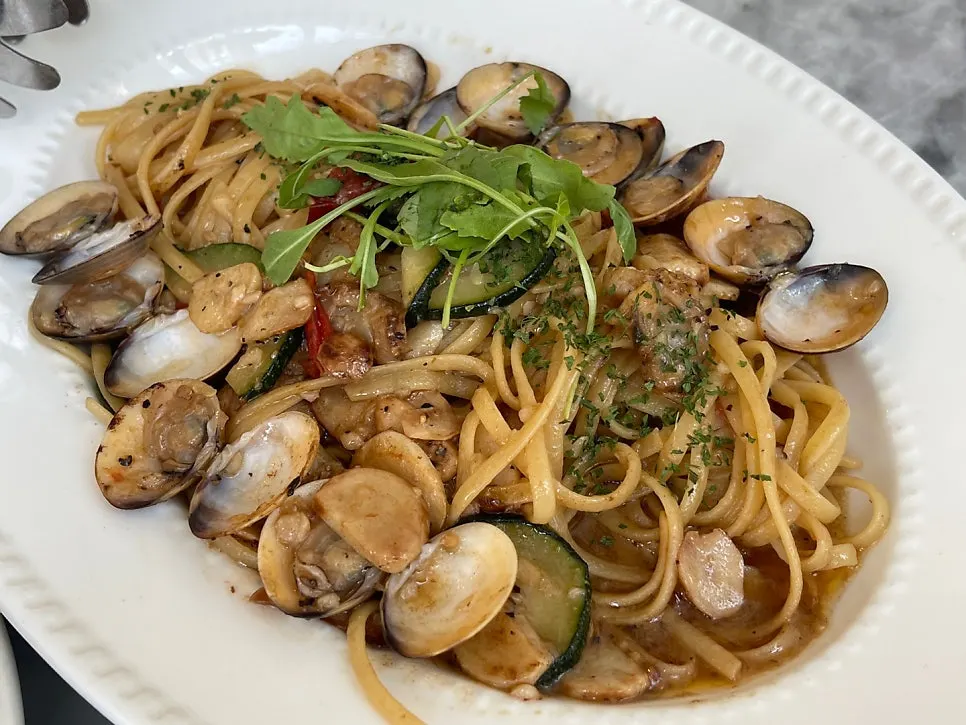 Surf clam pasta topped generously with clams