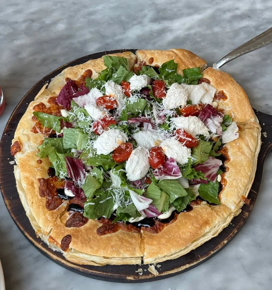 Ricotta cheese and salad pizza