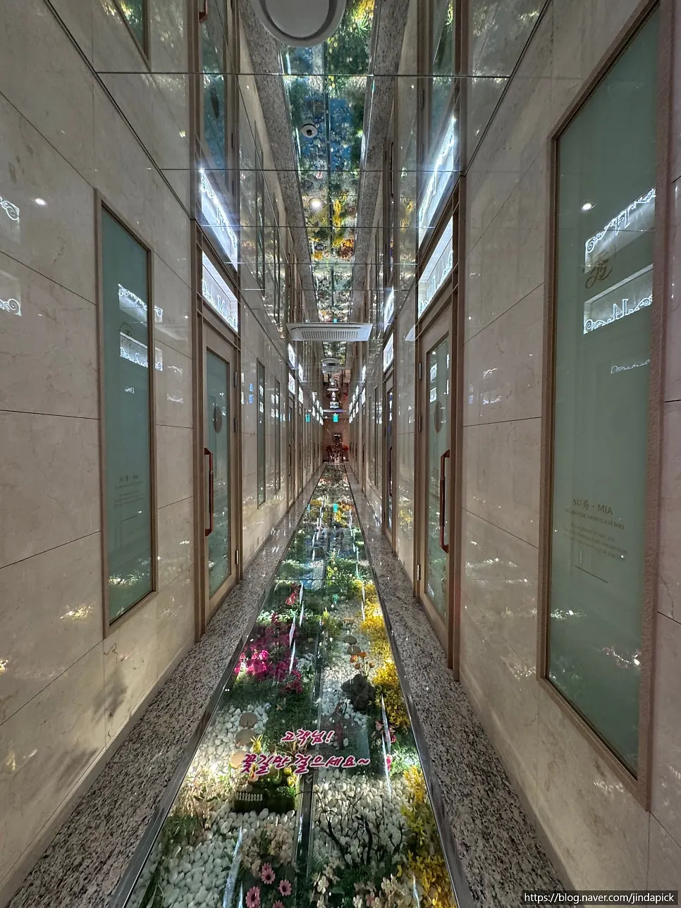 Su Noraebang corridor with glass-floor decoration