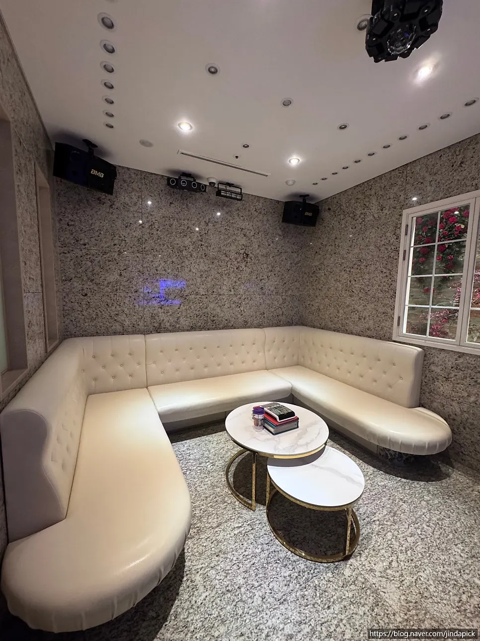 Spacious Gold Room with white and marble-like décor