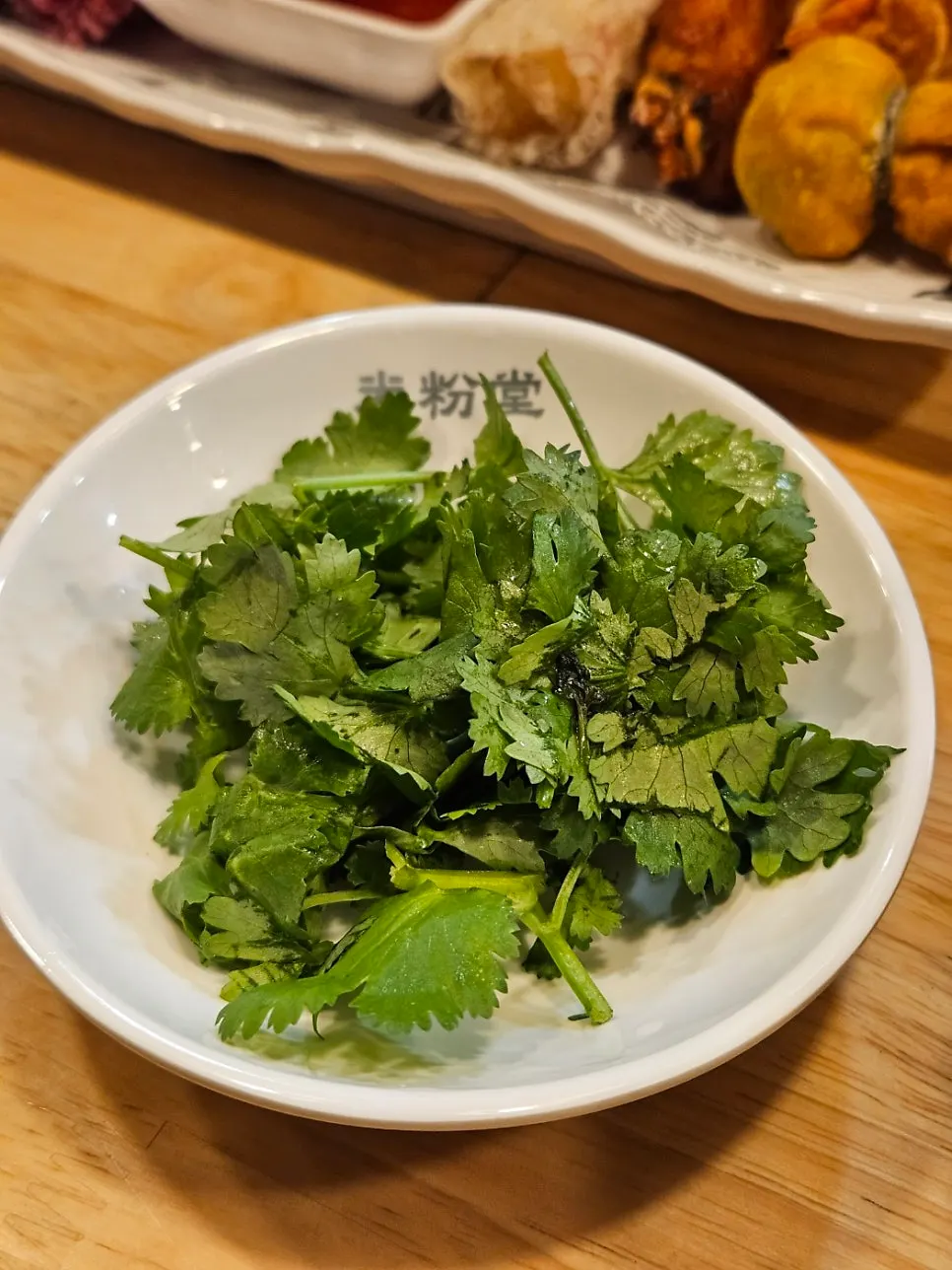 Noodles lifted up from the pho bowl